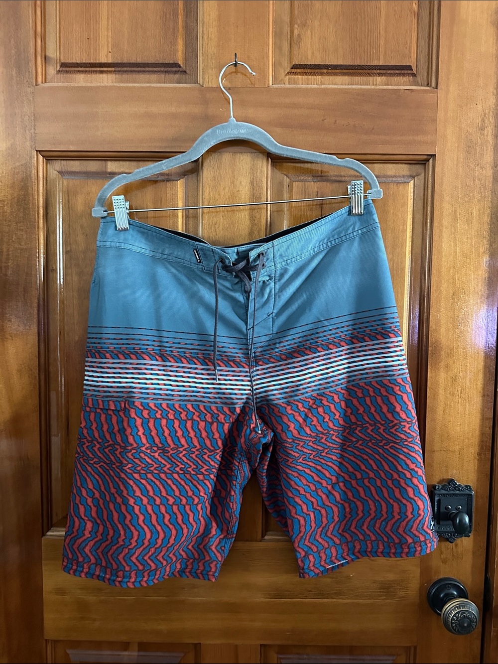 O'Neill Blue and Red Wave-Stripe Board Shorts